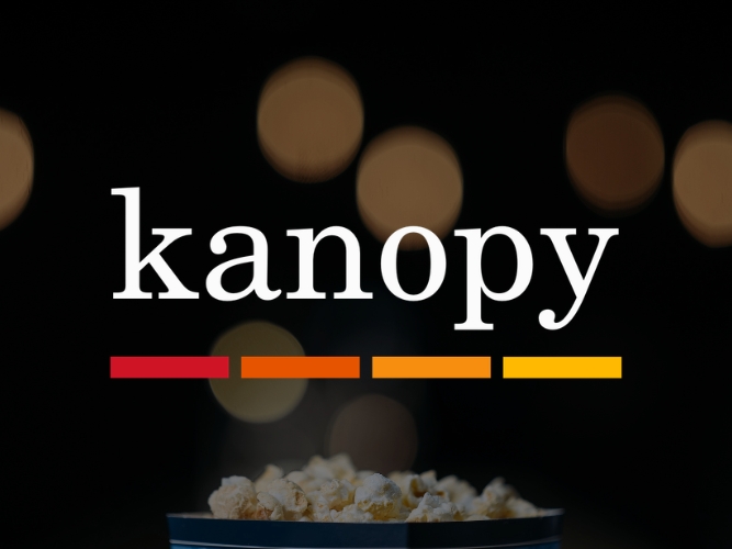 Kanopy logo in white text over a dark background with blurred lights. A popcorn bucket is visible at the bottom, evoking a cinematic feel.