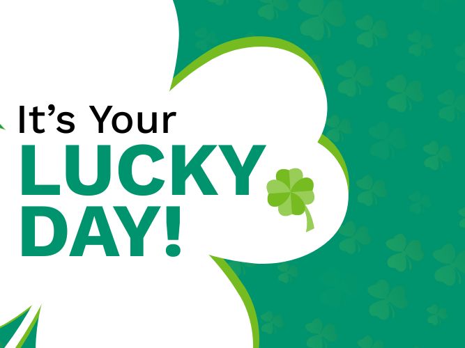 A large white shamrock on a green background with subtle shamrock patterns. Text reads 