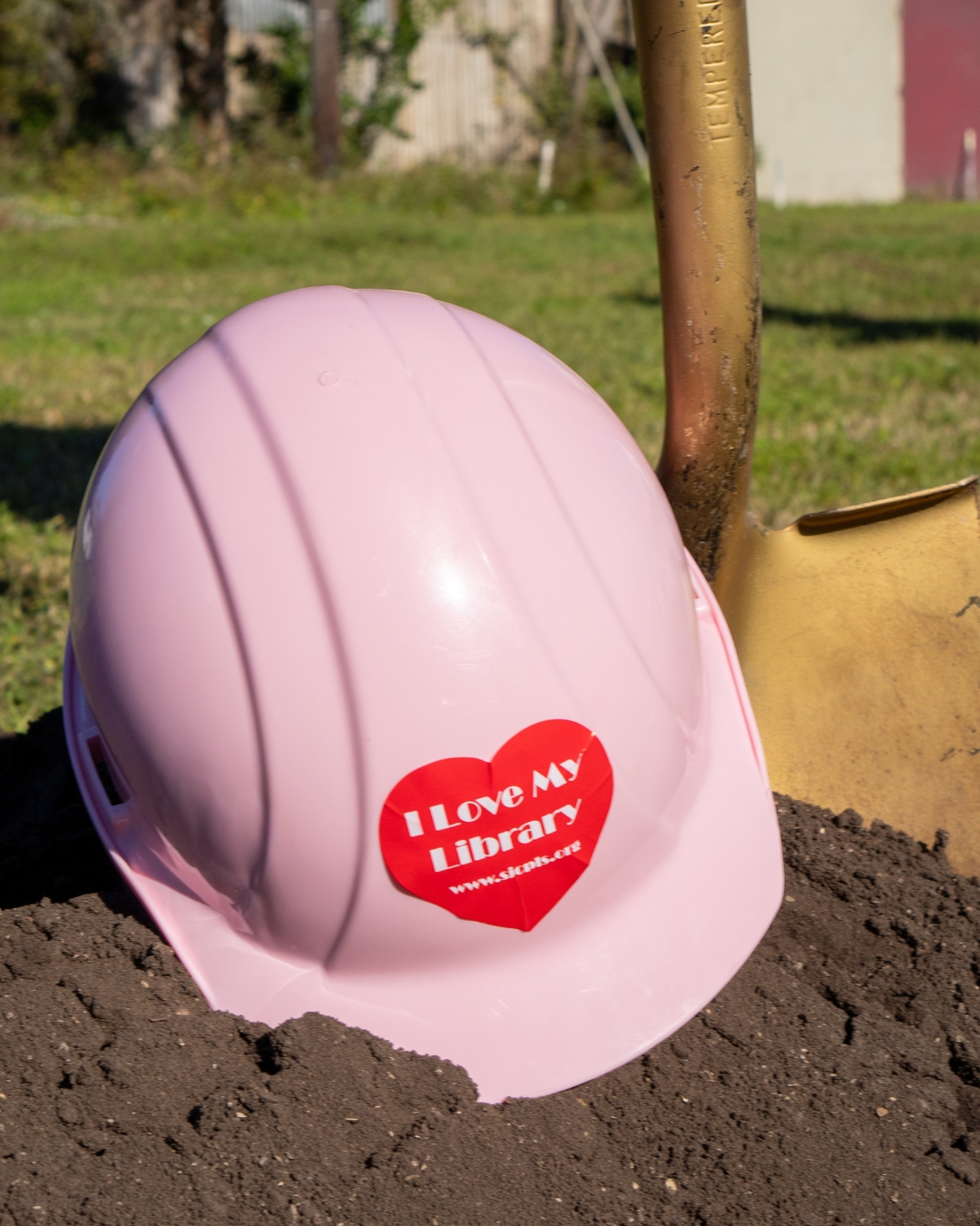 Pink hard hat with 